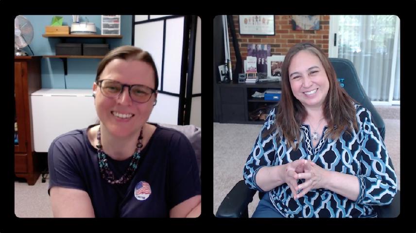 Two women smiling in a web meeting.