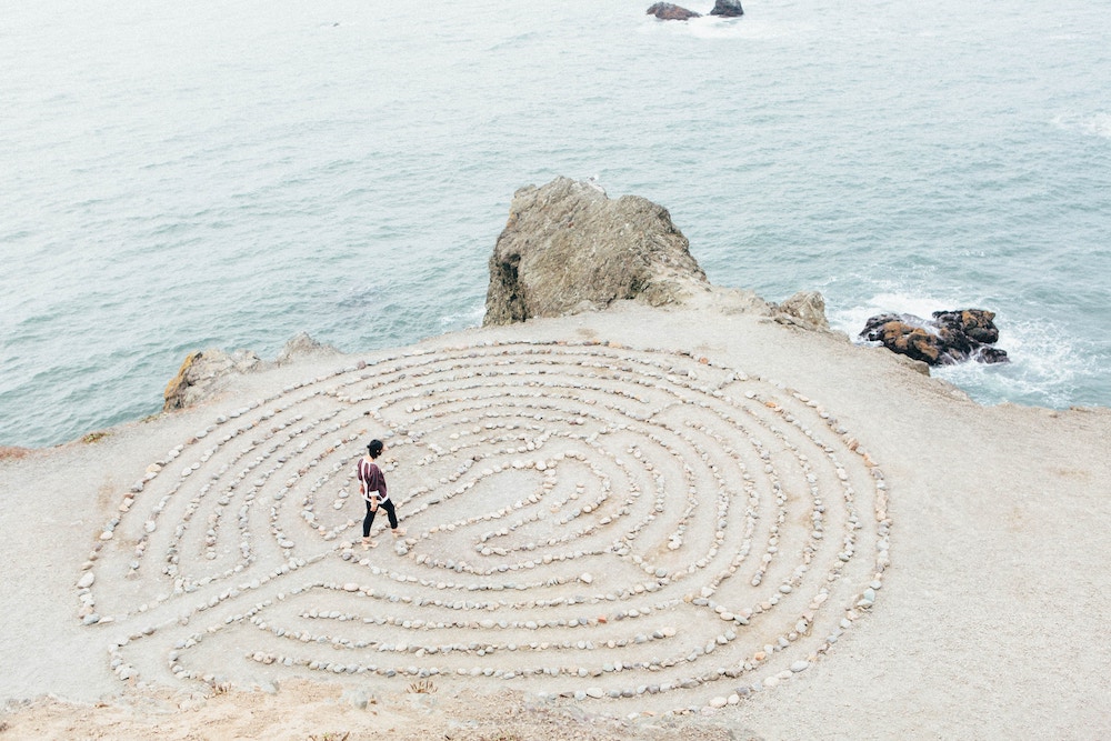 person walking a labyrinth